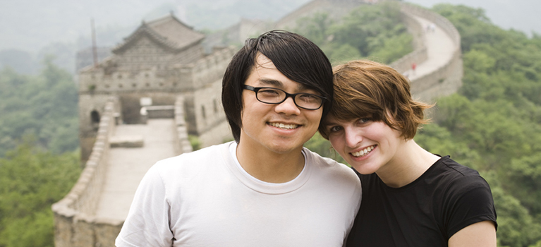 Mixed couple on Great Wall of China